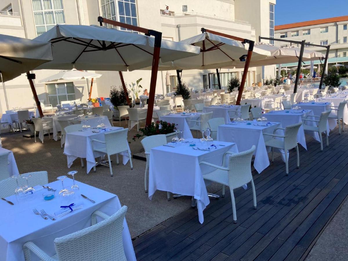 Toscana Charme Resort Tirrenia Kültér fotó Restaurant in Port of Skala