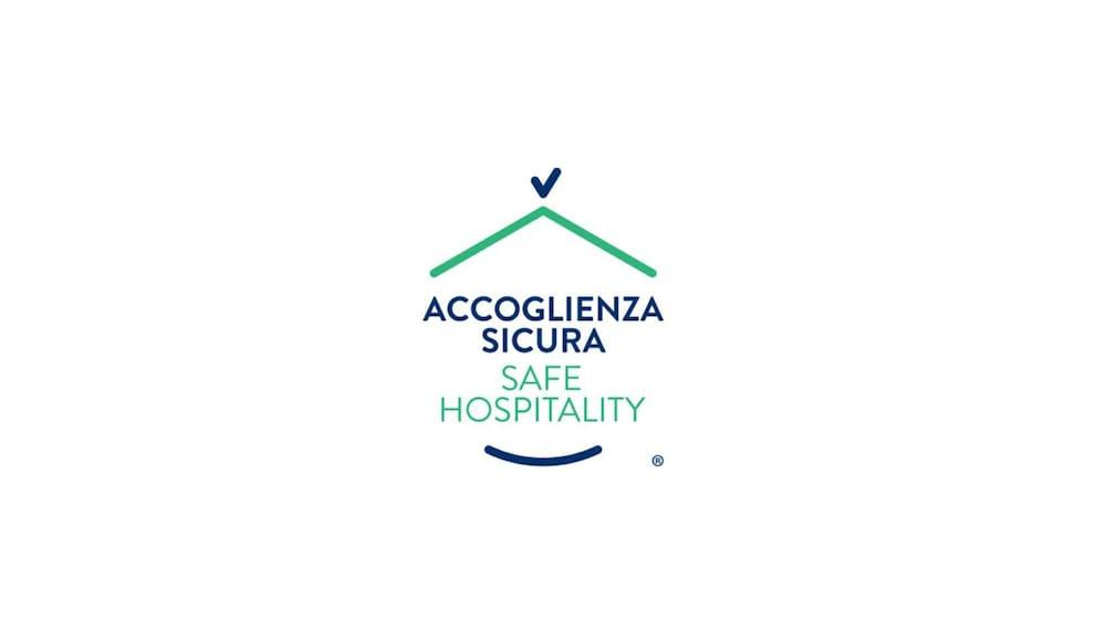 Toscana Charme Resort Tirrenia Kültér fotó Safe Hospitality logo